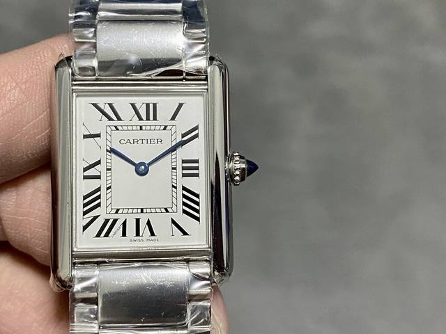Dr Cartier Tank Must series. The Tank Must watch draws direct inspiration from t