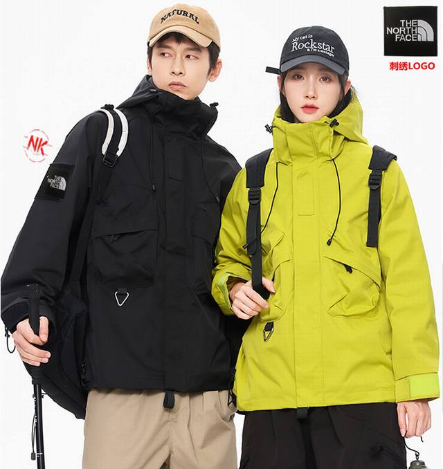 刺绣logo北面the North Face联名卡通神偷奶爸小黄人系列，海外春秋季限定全新系列连帽冲锋衣防风连帽夹克外套连帽外套！: 拼接风经典 诠释个性的涂鸦