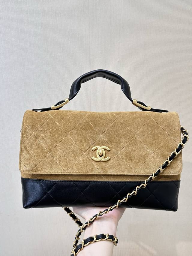 This is a 25A messenger bag in a two-tone apricot and black, made of original le