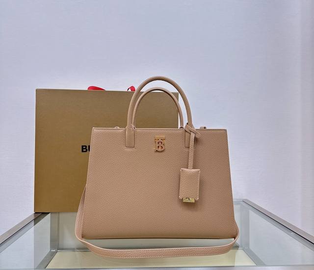Top-quality original leather, this is the latest structured Thomas Burberry tote