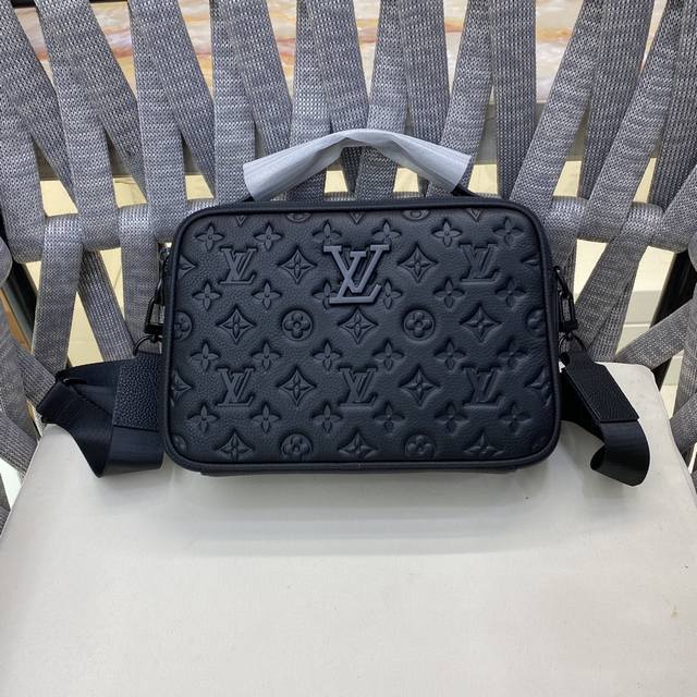 Louis Vuitton Embossed Print Messenger Bag, a classic travel accessory reimagine Louis Vuitton Embossed Print Messenger Bag, a classic travel accessory reimagine