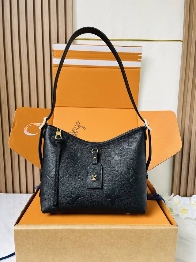 M46288 Carryall small handbag, crafted from Monogram Empreinte leather, features