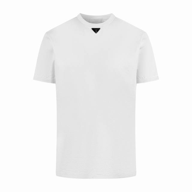 Prada short-sleeved shirt with the iconic Prada triangle logo on the chest. Made Prada short-sleeved shirt with the iconic Prada triangle logo on the chest. Made