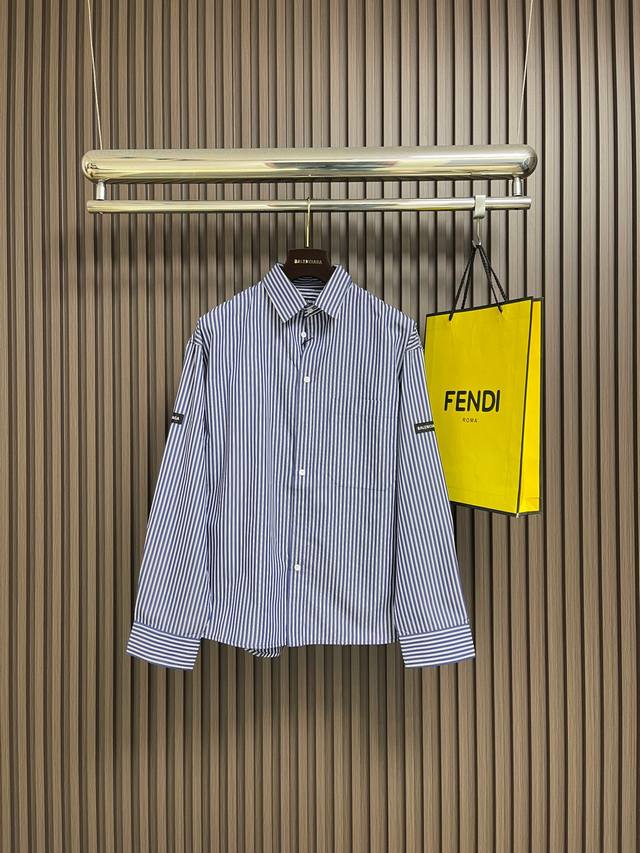 Balenciaga's signature striped long-sleeved shirt is made from a high-count comb Balenciaga's signature striped long-sleeved shirt is made from a high-count comb