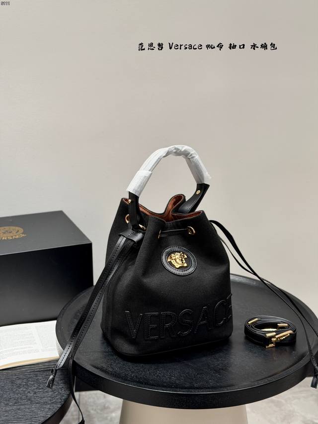 Gift Box Packaging Size: 20.21cm. This Versace canvas bucket bag is absolutely a