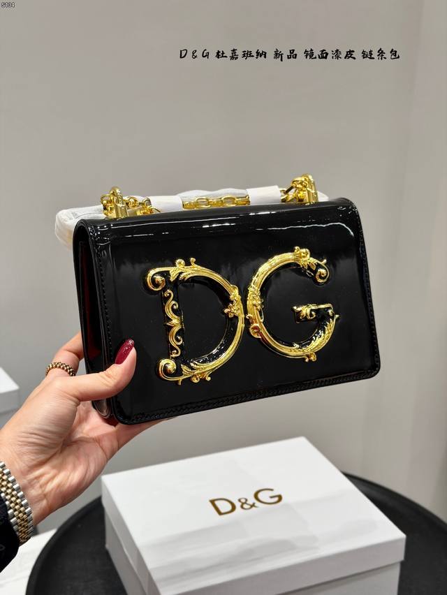 This new Dolce & Gabbana mirrored patent leather chain bag (with box) is absolut