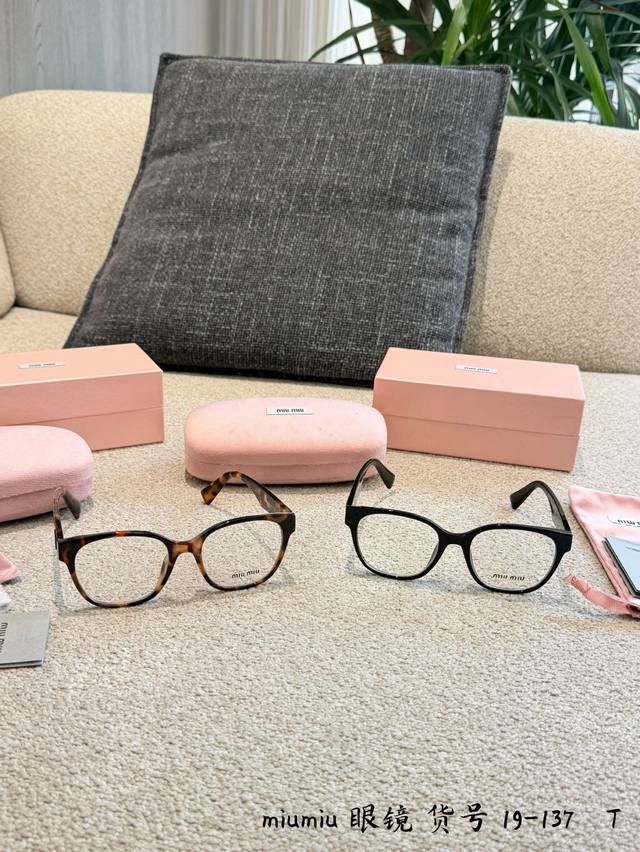Miumiu Tortoiseshell Acetate Eyeglass Frame. This Miumiu tortoiseshell acetate e
