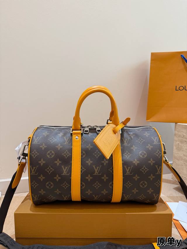Keepall Bandouliere City Bag, crafted from monogram Macassar canvas and colorful