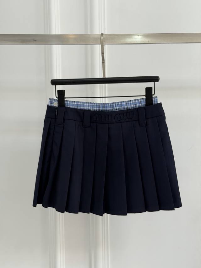 Original Miu Miu pleated skirt, women's style, complete with packaging. Navy blu