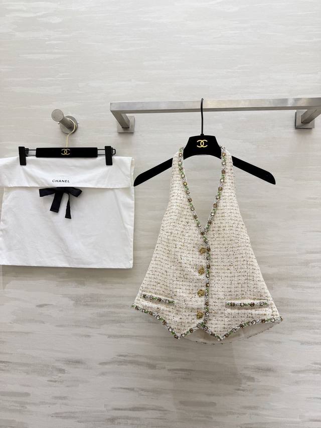 Chanel 2C Platinum Tweed Halter Vest: Classic tweed material, colorful beading,