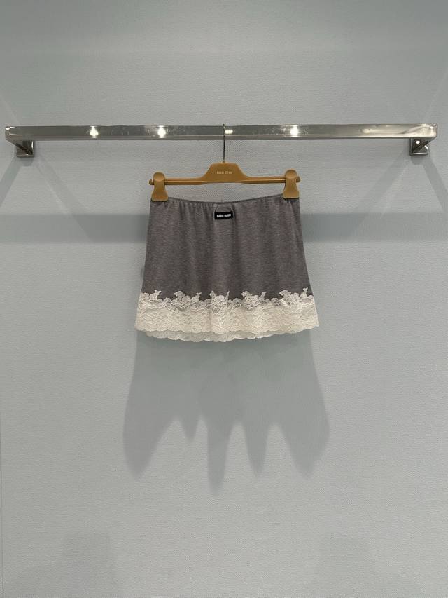Original quality women's Miu Mi* grey lace-trimmed midi skirt with packaging. So