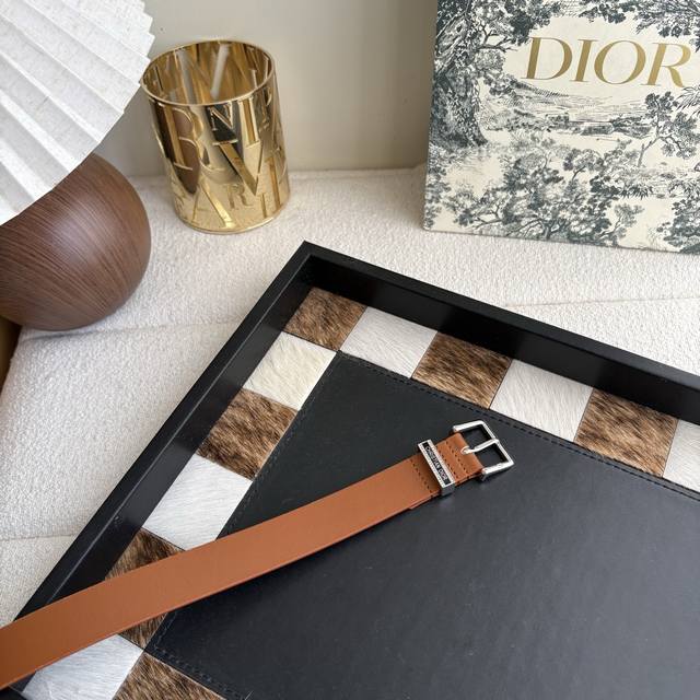 belt is meticulously crafted from smooth calfskin and other materials, adorned w