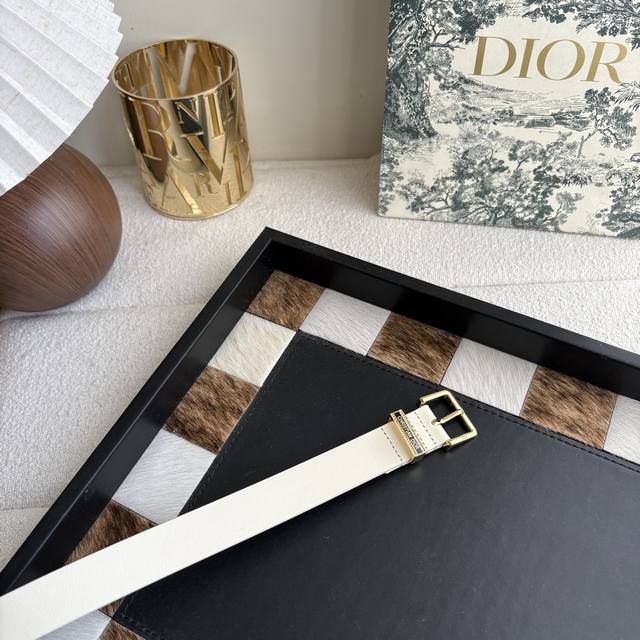 is meticulously crafted from smooth calfskin and other materials, adorned with a