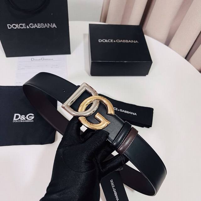Dolce & Gabbana Black Brown Reversible Calfskin Belt, cleverly designed for reve