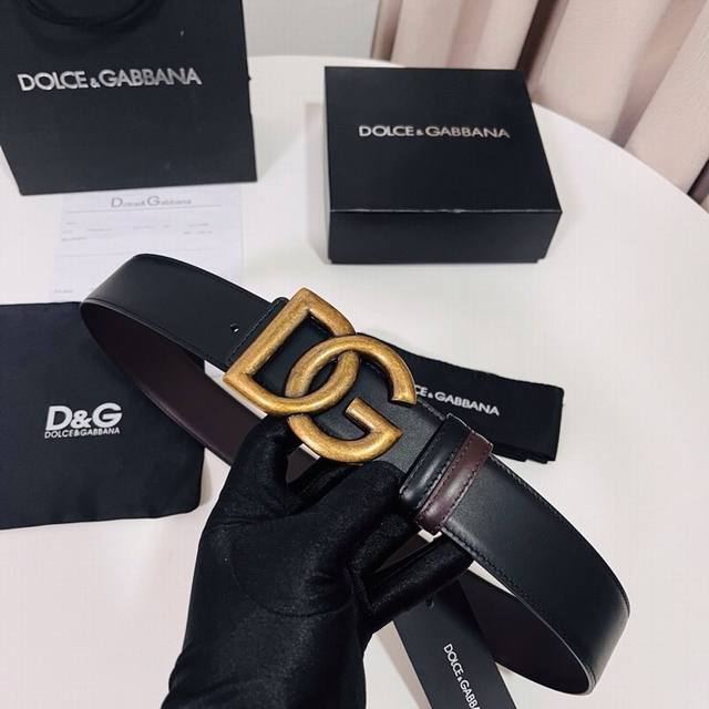 Dolce & Gabbana Black Brown Reversible Calfskin Belt, cleverly designed for reve