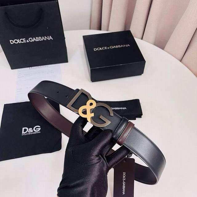 Dolce & Gabbana Black Brown Reversible Calfskin Belt, cleverly designed for reve
