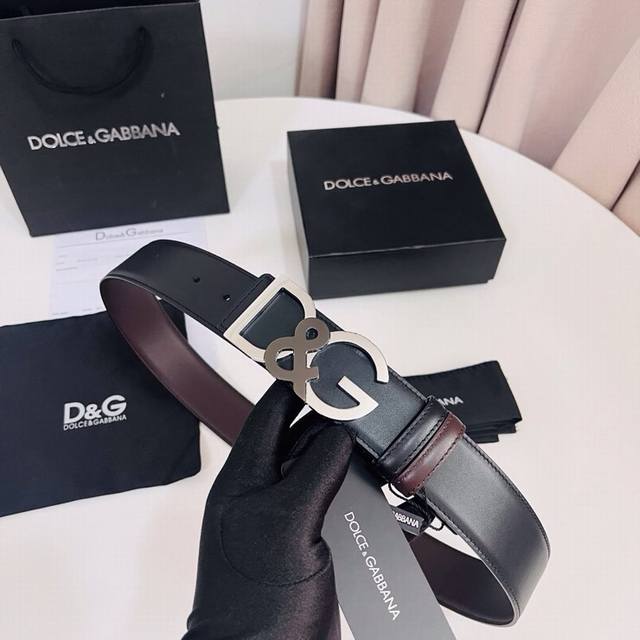Dolce & Gabbana Black Brown Reversible Calfskin Belt, cleverly designed for reve