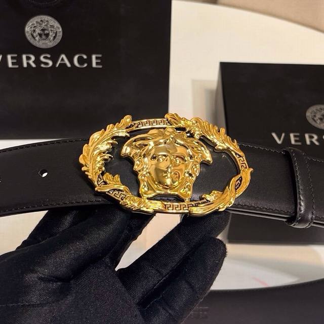 Versace's new calfskin leather belt, adorned with buckle Crest accessories. The