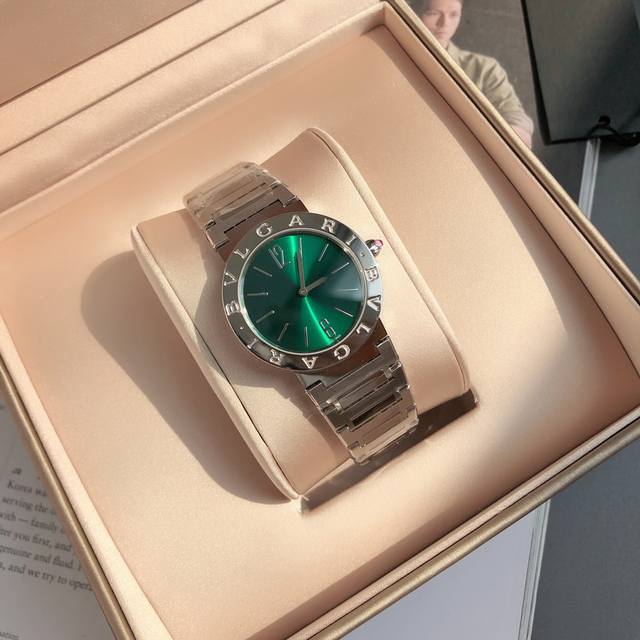 Bv Bulgari Ladies' Quartz Watch. This watch uses the Bulgari logo as a design el Bv Bulgari Ladies' Quartz Watch. This watch uses the Bulgari logo as a design el
