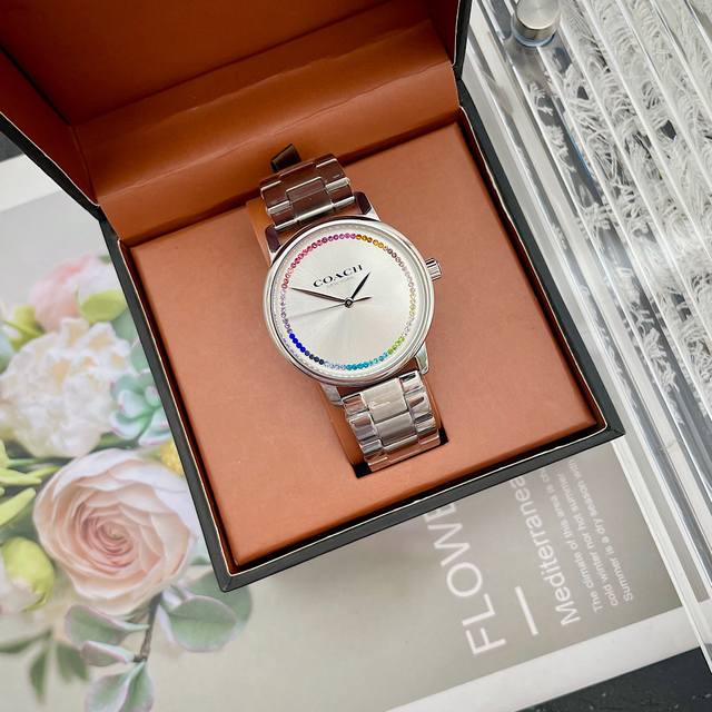 Authentic Coach women's quartz watch. This watch features a silver metal strap, Authentic Coach women's quartz watch. This watch features a silver metal strap,
