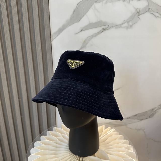 Hot new Prada mink fleece bucket hat, featuring a high-end European and American