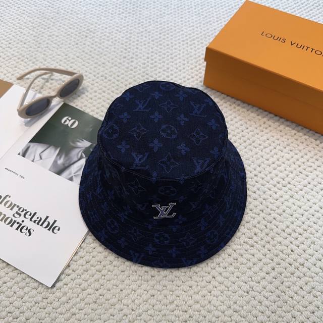 Louis Vuitton's new soft denim bucket hat. Summer is here, and in the hot weathe