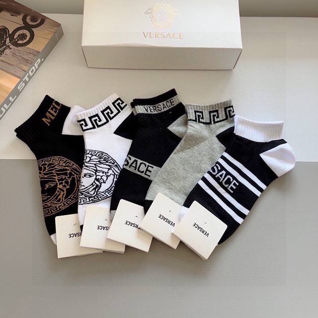 Includes packaging. One box contains five pairs of Versace socks, a top European