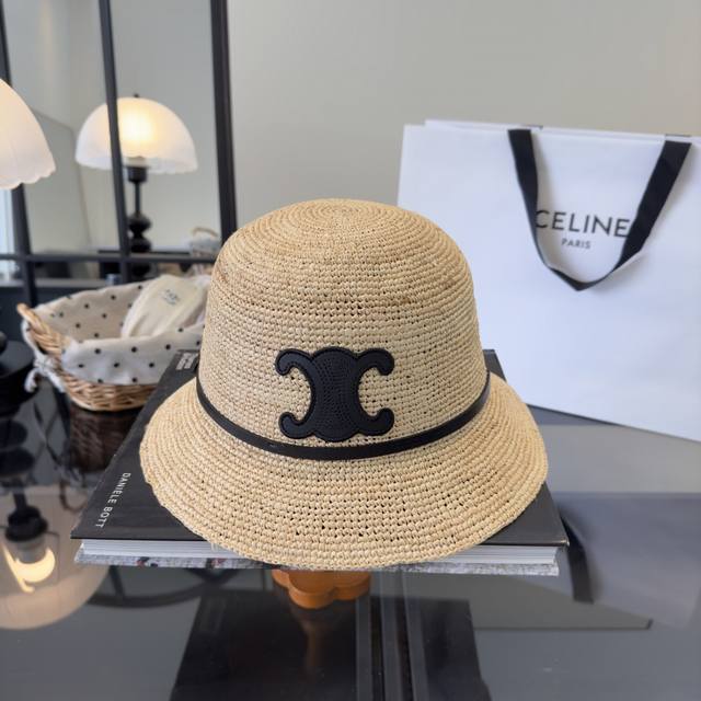 Celine's new raffia hat, hand-crocheted, head circumference 57cm. Celine's new raffia hat, hand-crocheted, head circumference 57cm.