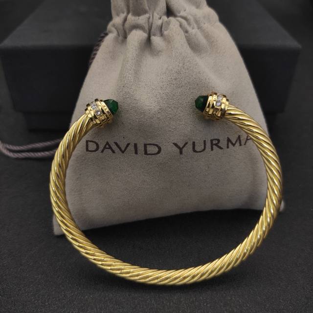 David Yurman 5mm gold bangle with deep green diamonds. Recommended wrist size: 1