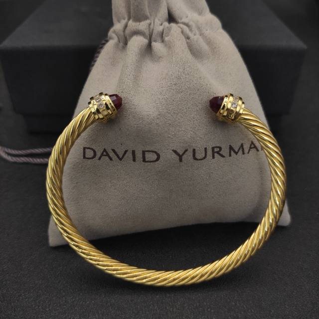 David Yurman 5mm gold bangle with diamonds and red diamonds. Recommended wrist s