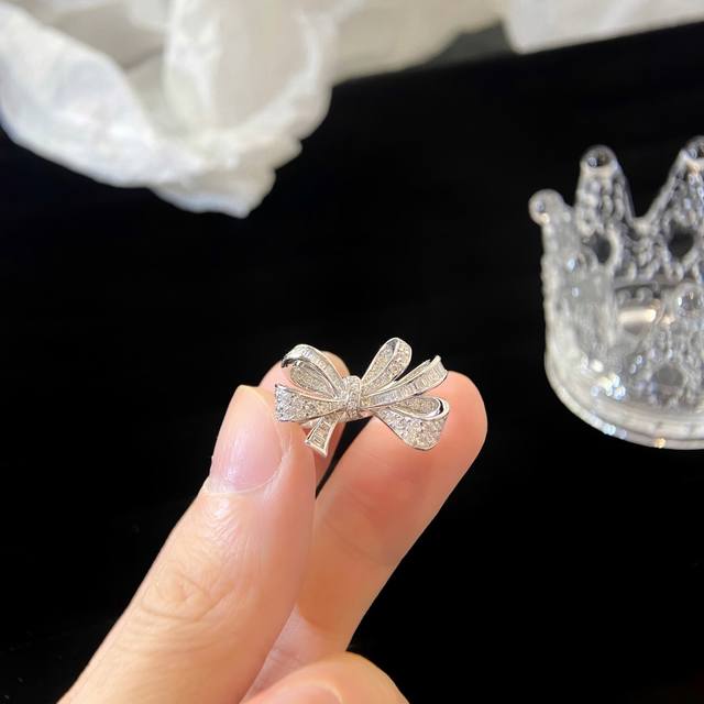 Graff Bow Ring, size 5678. This ring satisfies a girl's heart while offering a s Graff Bow Ring, size 5678. This ring satisfies a girl's heart while offering a s