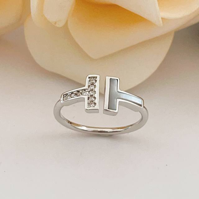 , Sizes 6, 7, 8. Tiffany & Co.'s latest silver diamond-encrusted dou