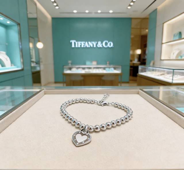 Tiffany & Co. boutique-quality silver bracelet, celebrity-endorsed retro distres
