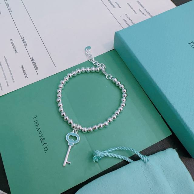 Tiffany & Co. boutique-quality silver bracelet, celebrity-endorsed retro distres