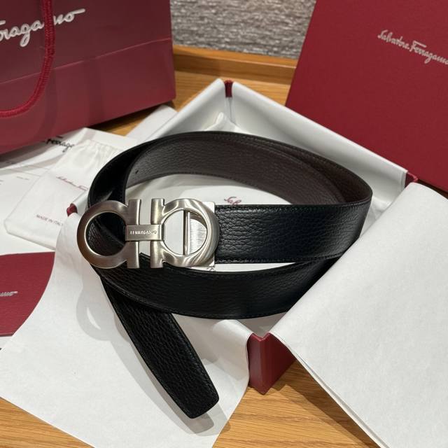 Sf Reversible Adjustable Gancini Leather Belt This exquisite leather belt is cra