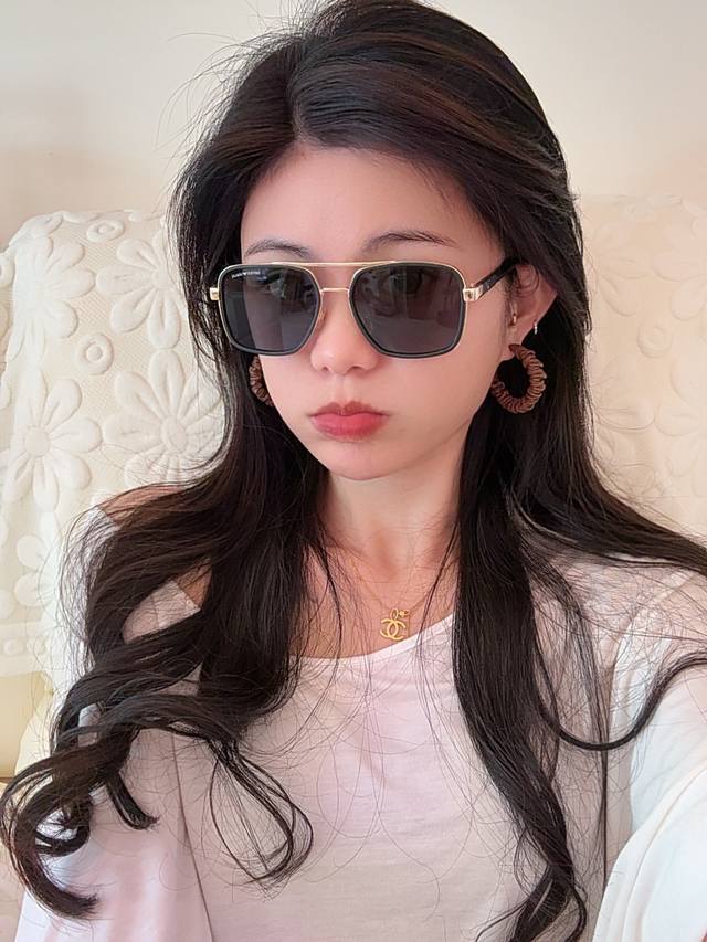Armani's new ultra-versatile metal sunglasses feature an oversized frame that pe Armani's new ultra-versatile metal sunglasses feature an oversized frame that pe