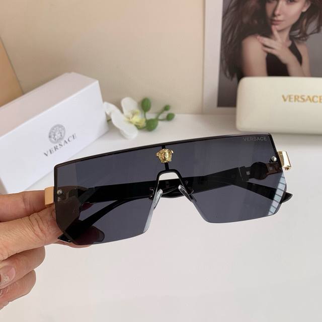 Versace European and American style aviator sunglasses, frameless integrated len Versace European and American style aviator sunglasses, frameless integrated len