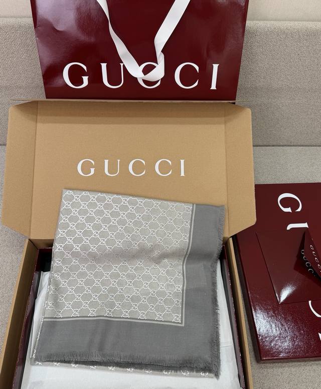 New Grey Gucci Scarf with the iconic Gg pattern and elegant color scheme, showca