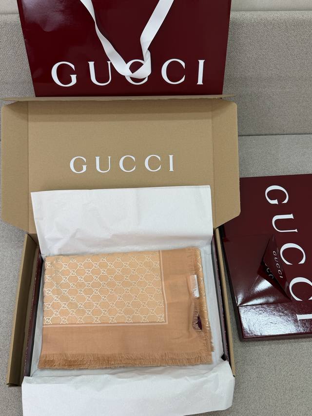 New Pink Gucci Scarf with the iconic Gg pattern and elegant color scheme, showca