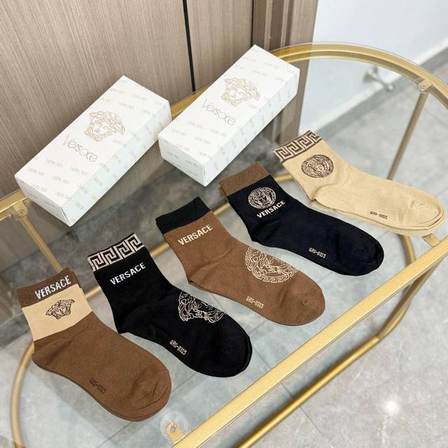 A box of five pairs of Versace socks from the top European and American brand, a A box of five pairs of Versace socks from the top European and American brand, a
