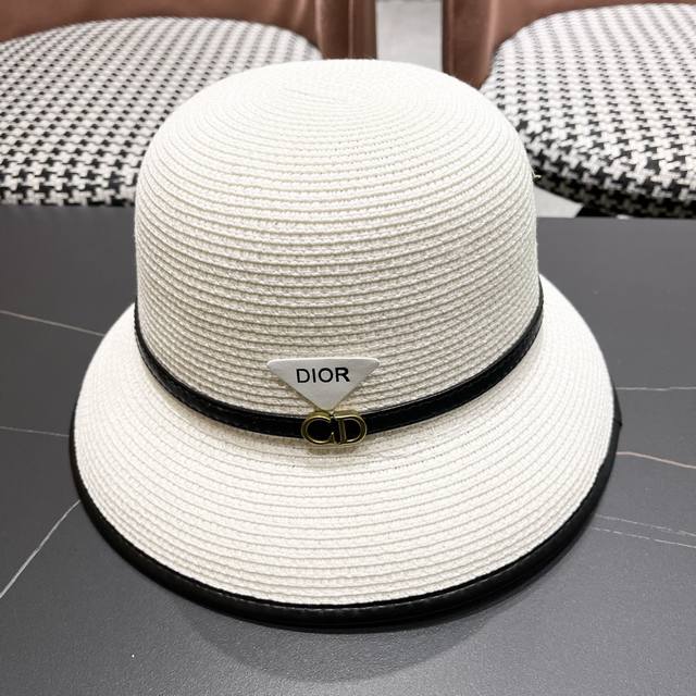Dior's new bucket hat/strawberry hat has a beachy vibe, simple and stylish, a ve
