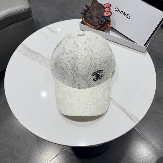 Chanel baseball cap, featuring the classic double C logo and a sleek baseball ca Chanel baseball cap, featuring the classic double C logo and a sleek baseball ca
