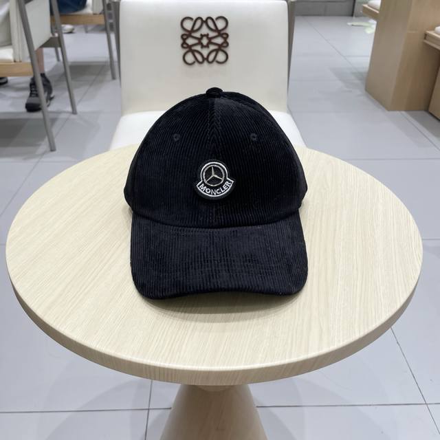 Moncler's new early autumn baseball cap, a stylish and trendy street style item,