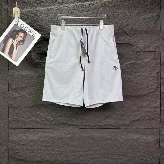 Descente 2026 New Zipper Pocket Classic Letter Badge Couple Shorts (High Version