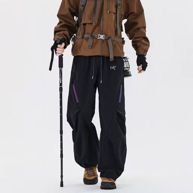 上新100 Arc'teryx 始祖鸟春夏款新款户外冲锋裤登山运动裤暴雨防泼水休闲工装裤男韩版潮流百搭宽松伞兵裤可调节裤脚 户外休闲登山徒步休闲长裤特定面料，非