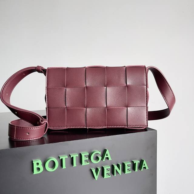 p Top-of-the-line: Bottega Veneta Cassette Pillow Bag, Burgundy. The wide, woven