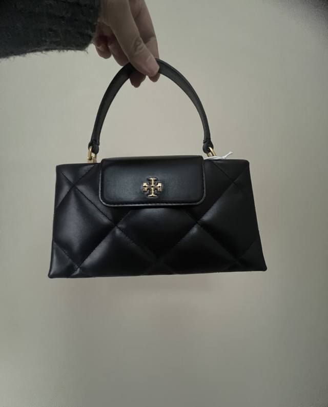 New arrival: Tory Burch Kira series mini quilted bag (560), crafted from supple New arrival: Tory Burch Kira series mini quilted bag (560), crafted from supple