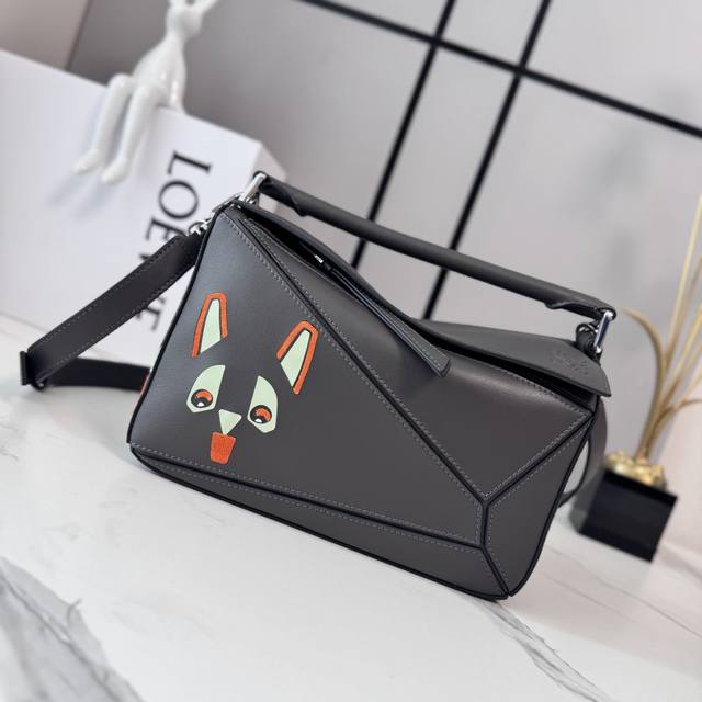 1660 Loewe's new small classic calfskin Fringe Cat puzzle handbag. The puzzle fe