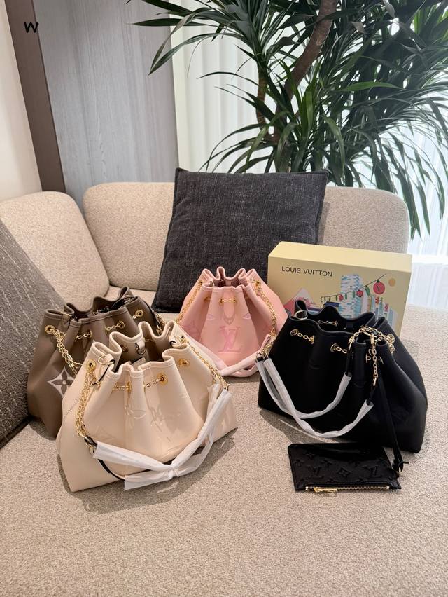 LV Bundle Black and Gold Bucket Bag The LV Bundle Black and Gold Bucket Bag, a s LV Bundle Black and Gold Bucket Bag The LV Bundle Black and Gold Bucket Bag, a s