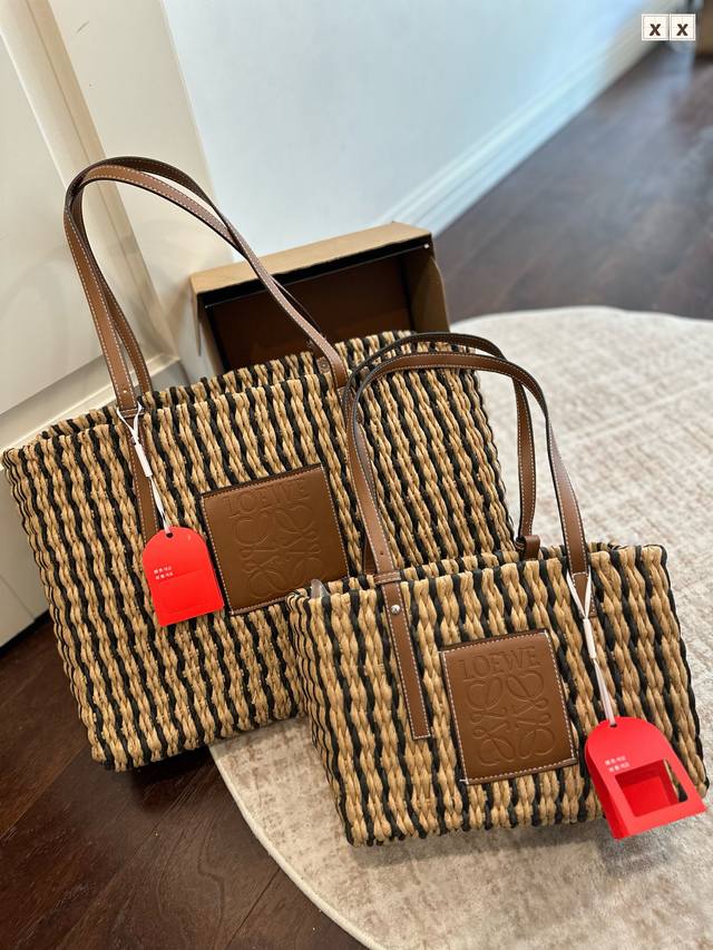 Loewe woven tote bag in airplane box packaging. The Paulus's 1Biza Summer Island